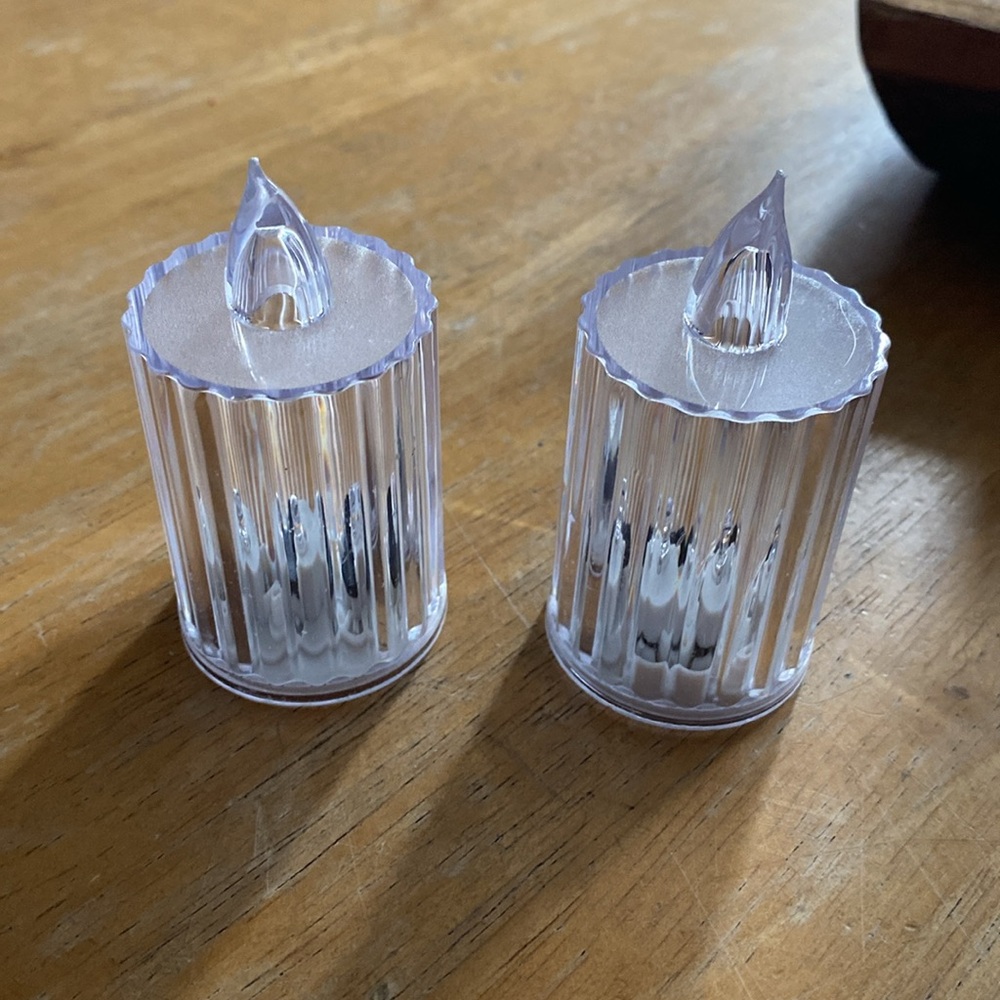 Candles clear. Comes with Two battery  operated candles.